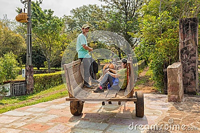 Poor indigenous family in Paraguay with uniaxial carriage and horse. Editorial Stock Photo