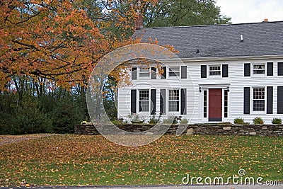 Colonial Home in Autumn Stock Photo