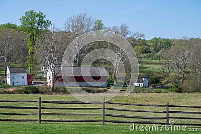 Colonial idyllic rural village scene with barn store house outbuilding Stock Photo