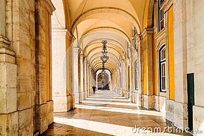 Colonnade and archways by the Commercial Square, Lisbon. Editorial Stock Photo