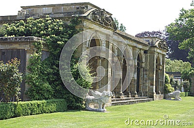 Colonnade and lion statues at Hever castle Italian garden in England Stock Photo