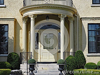 Colonnaded house entrance Stock Photo