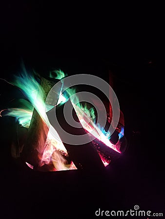 Color changing fire camping story Stock Photo