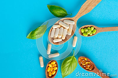 Color Dietary Supplements, Vitamin Capsules, Mineral Pills, Healthy Multivitamin Capsule Stock Photo