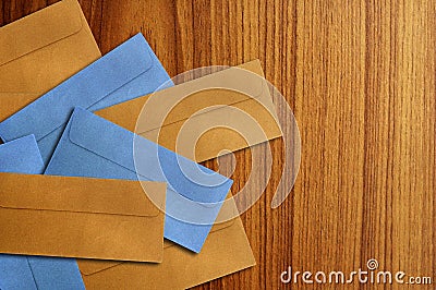 Color envelope isolated on the wooden Stock Photo