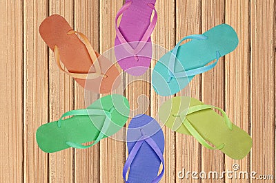 Color flip-flop over wooden texture close-up Stock Photo