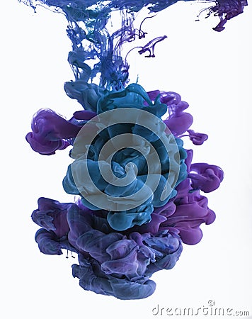 Color ink drop in water. Cyan, blue violet. Stock Photo