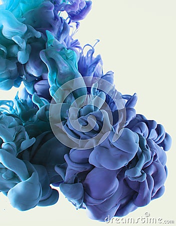 Color ink drop in water. Cyan, blue violet. Stock Photo