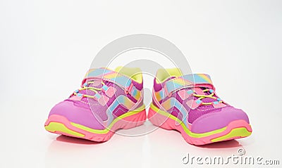 Color kid sneakers shoes on floor front view soft focus Editorial Stock Photo