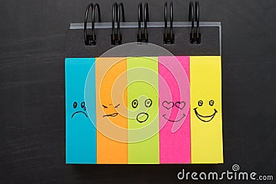 Color notebook with painted different emotions Stock Photo