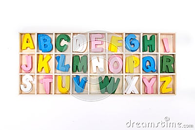 Color painted wooden english alphabet set in wooden box Stock Photo