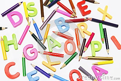 Color Pencils and Alphabets Stock Photo