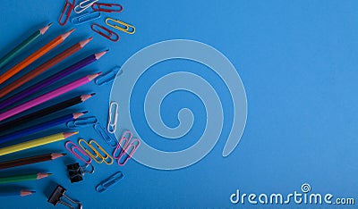 Color pencils on blue background Stock Photo