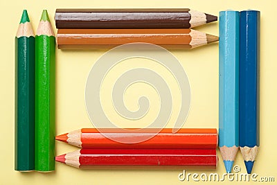 Color pencils forming a rectangle frame Stock Photo
