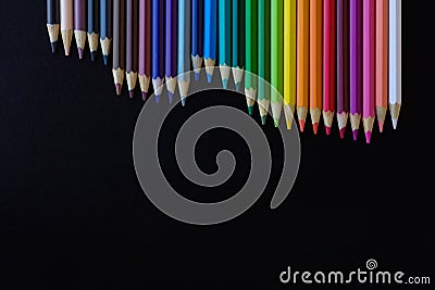 Color pencils isolated on black background, with copy space for text. Stock Photo