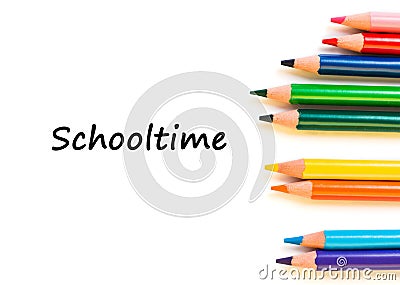 Color pencils isolated on white background. Text schooltime. Stock Photo