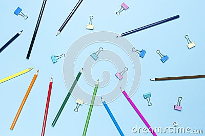 Color pencils on pastel blue background top view flat lay with copy space. Wooden colored pencils for drawing, objects Stock Photo