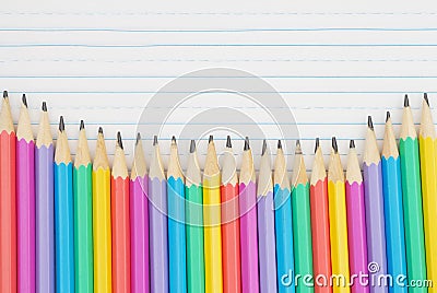 Color pencils on vintage ruled line notebook paper Stock Photo