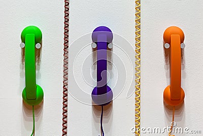 Color phones and phone cords Stock Photo