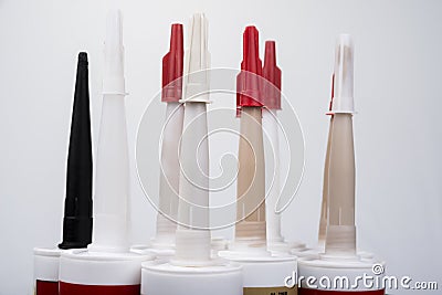 Color sanitary silicone on a white background Stock Photo