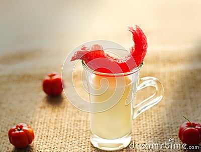 Color warm tone red flavored puffed fried on the top of glass milk Stock Photo