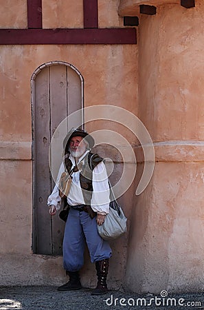 Colorado Renaissance Festival. An actor posing in the costume of medieval bard Editorial Stock Photo