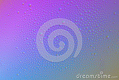 Colored abstract background from drops on glass. Rainbow color transitions Stock Photo