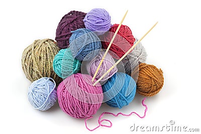 Colored balls of yarn with two knitting needles Stock Photo