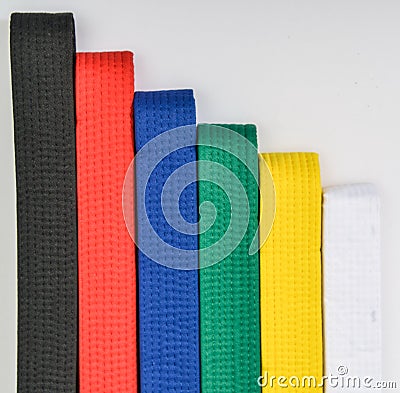 Colored belts in martial arts Stock Photo