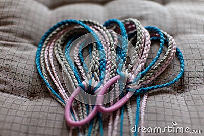 Colored braids made of pink and blue artificial hair Stock Photo