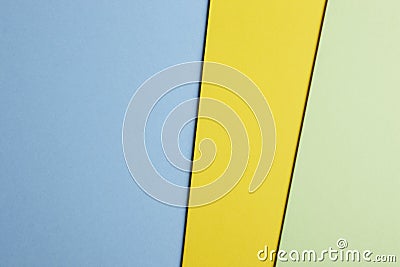 Colored carboards background in blue yellow green tone. Copy spa Stock Photo