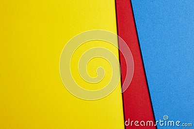 Colored carboards background in yellow, red, blue tone. Copy spa Stock Photo