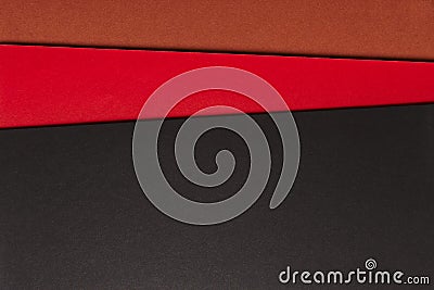 Colored cardboards background in black red brown tone. Copy space Stock Photo