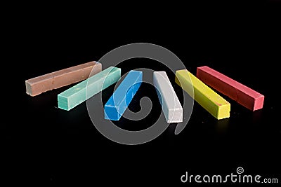 Colored chalk on a blackboard background Stock Photo