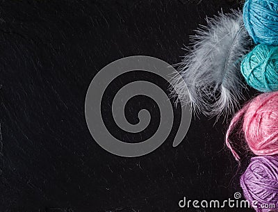 Colored clew on slate background with copyspace Stock Photo