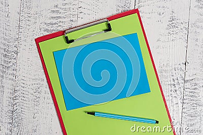 Close up front view colored clipboard blank paper sheet sticky note marker lying retro old wooden rustic vintage Stock Photo