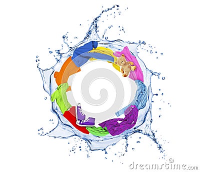 Colored clothes rotates in a swirling splashes of water on white Stock Photo