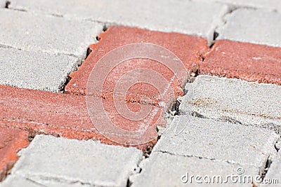 Colored concrete flooring assembled on a substrate of sand type of flooring permeable to water . Stock Photo