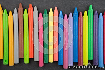 colored crayons on the blackboard Stock Photo