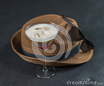 Colored drink, a combination of red, beige and violet, martini g Stock Photo