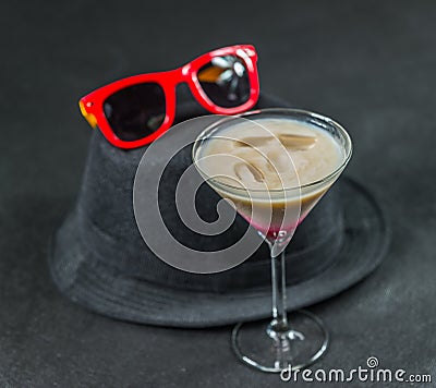 Colored drink, a combination of red, beige and violet, martini g Stock Photo