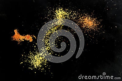 Colored dust explosions splashes isolated on black Stock Photo