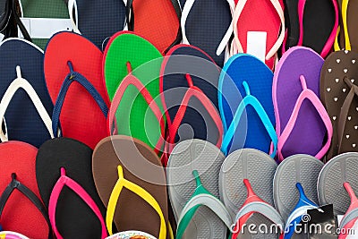 Colored flipflops. Outdoor multicolored footwear for summer Stock Photo