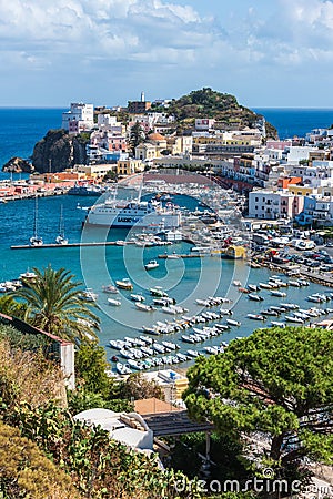 Colored houses, boats, ferry in the harbor of island of Ponza. Italy Editorial Stock Photo