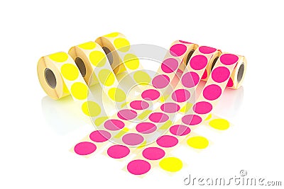 Colored label rolls isolated on white background with shadow reflection. Color reels of labels for printers. Labels for direct the Stock Photo