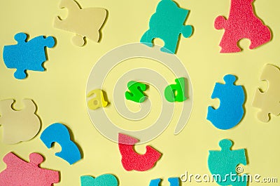 Colored letters ASD word with multicolored puzzle elements Stock Photo