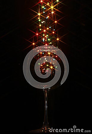 Colored lights in the form of six-rays star in the glass Stock Photo