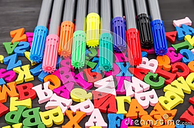 Colored markers and letters. School concept background. Time to go to school. Stock Photo