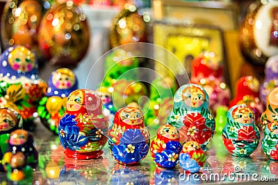 colored matrioskas at the russian shop Stock Photo