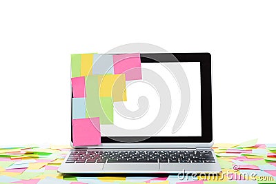 Colored memos stuck to a blank laptop screen Stock Photo